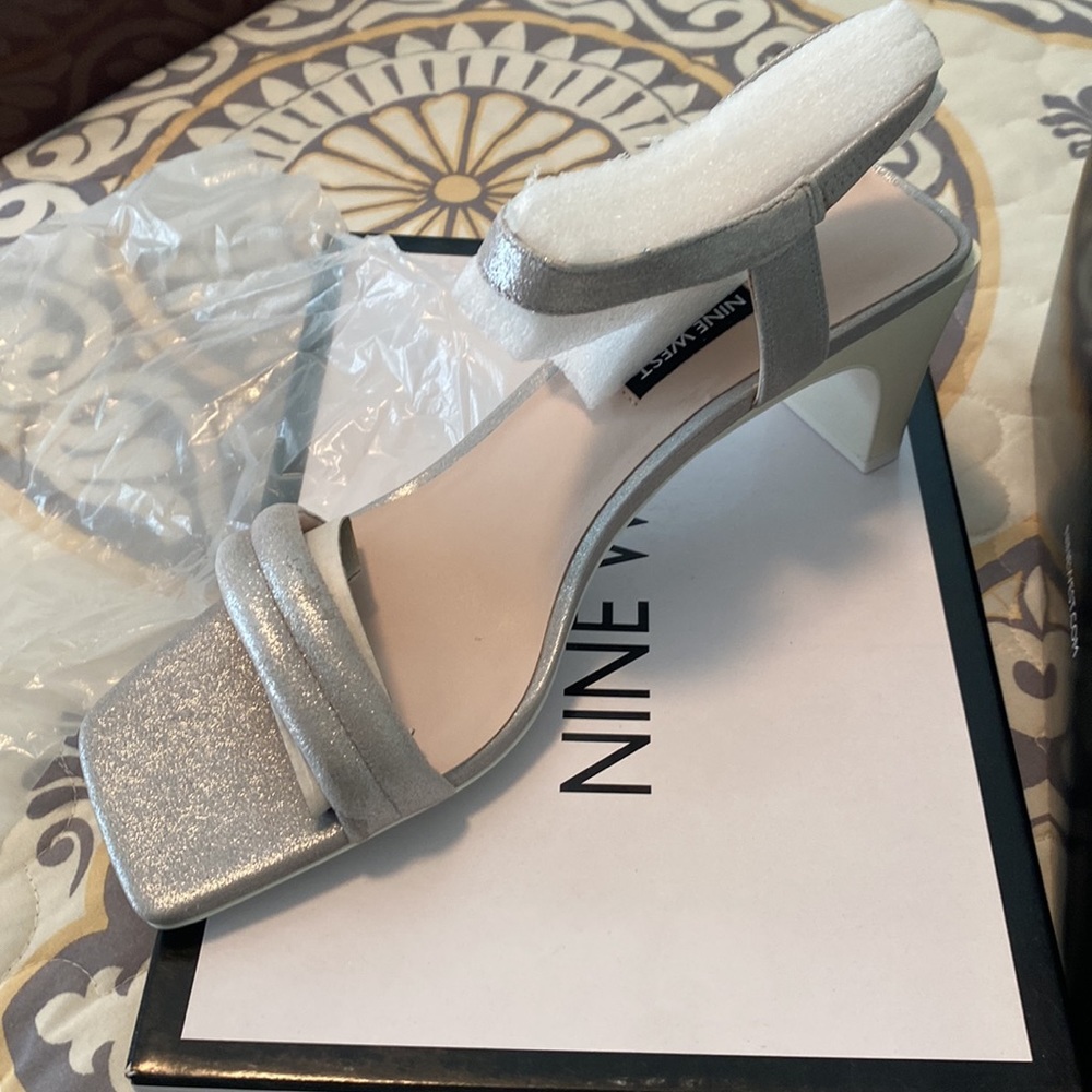 Brand-new silver Nine West dress sandals. Never been worn!